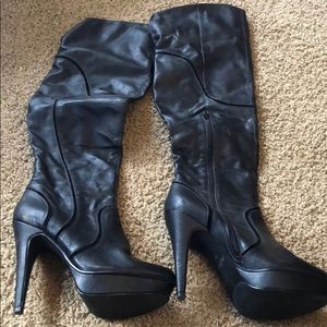 Over the knee black leather heels